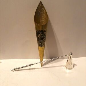Vintage brass cone shaped match holder  with silver candle snuffer.